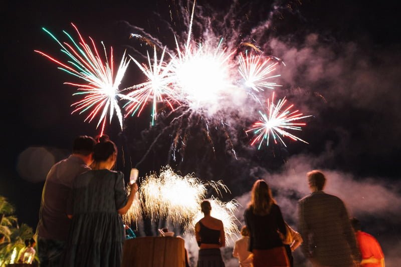 New Year celebration, stunning firework display, glowing, glimmering over by the beach at Devasom.
